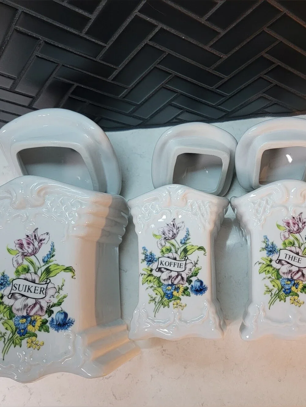 Set Of 4 Delfts Hand Made White Floral Ceramic Canisters
